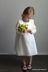 Such a sweet classic dress made from an upcycled sheet and curtain.