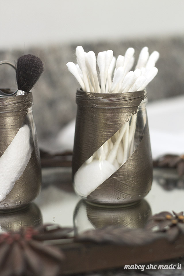 Upcycled Bathroom Organizers from Baby Food Jars