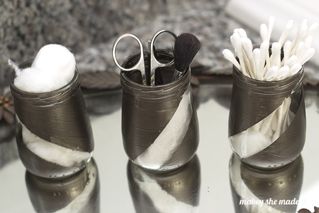 Upcycled Bathroom Organizers from Baby Food Jars