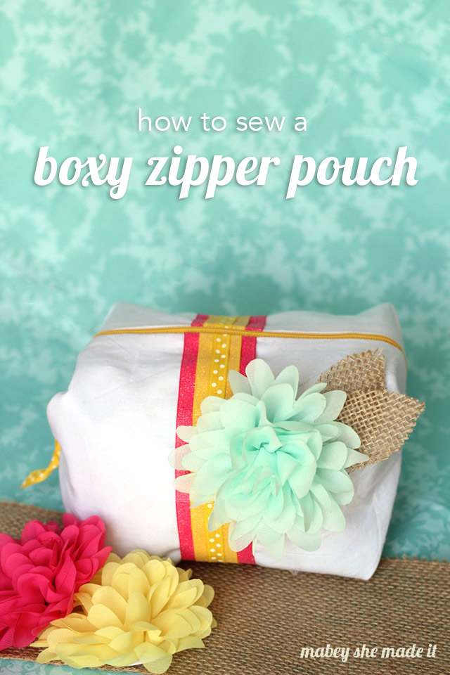 This amazing boxy zipper pouch holds a TON and has such cute detail on the ends. Tutorial shows you how to make one from Mabey She Made It.